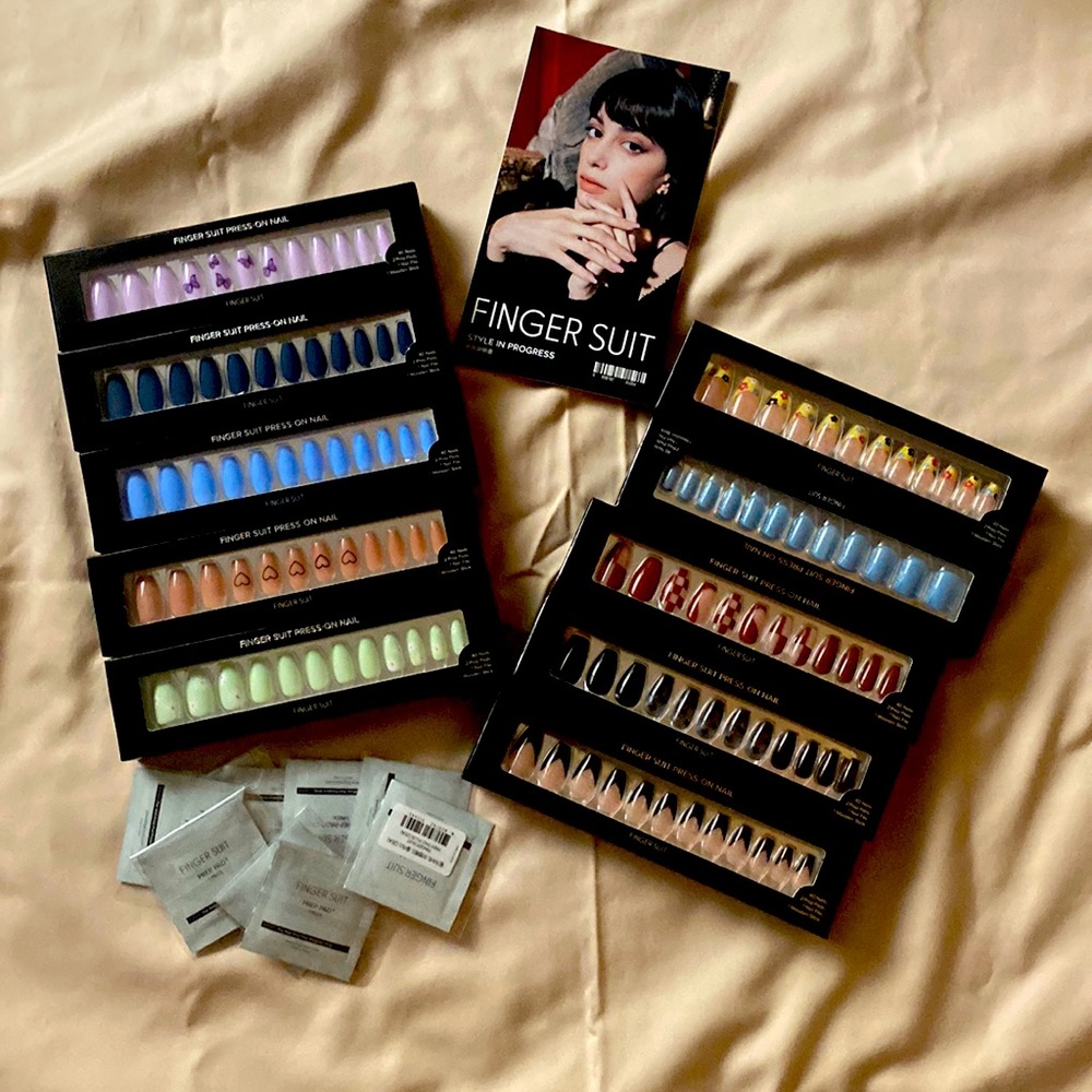 10 boxes of finger suit press on nails.